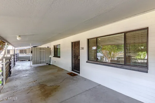 a view of livingroom with furniture and windows