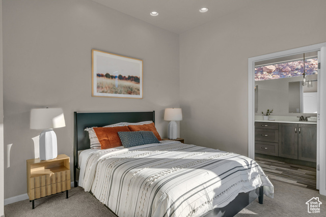 101 Chuckwalla Lane Springdale, UT 84767 - Photo 8 of 51 Bedroom featuring connected bathroom, light colored carpet, and recessed lighting