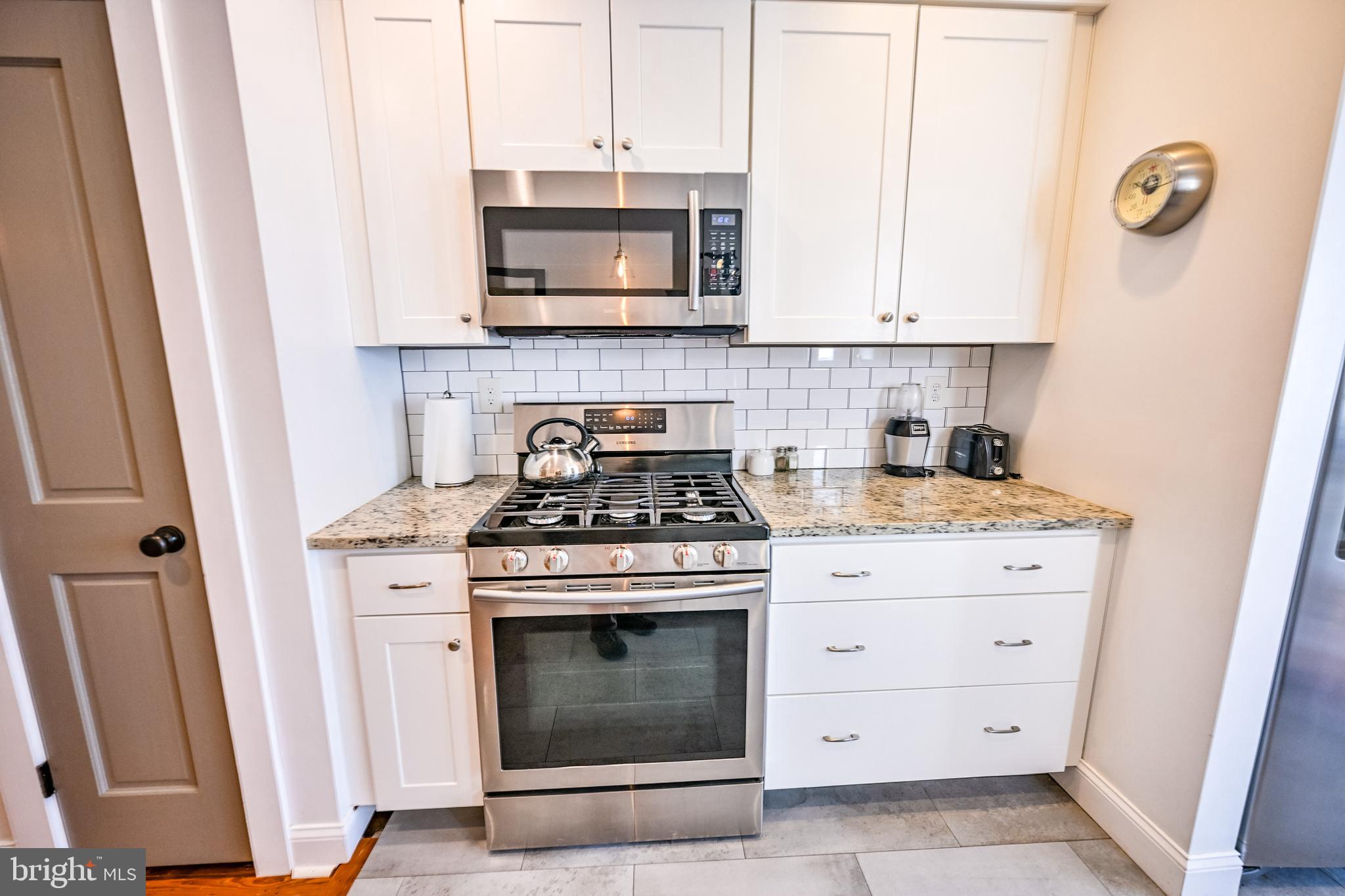 2939 Keswick Road Baltimore, MD 21211 - Photo 15 of 55 Gourmet kitchen w/ granite counters & SS appl
