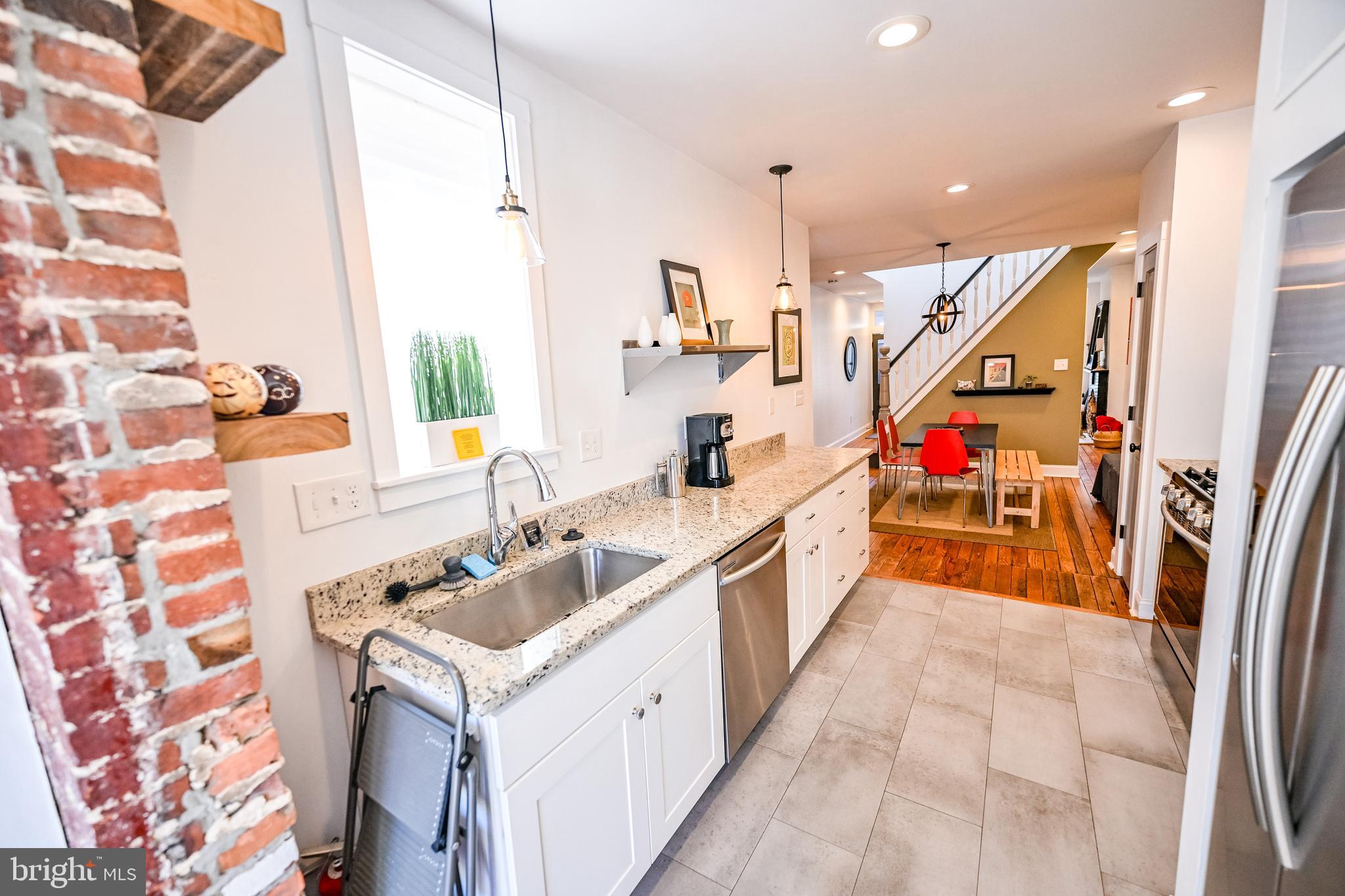 2939 Keswick Road Baltimore, MD 21211 - Photo 16 of 55 Gourmet kitchen w/ granite counters & SS appl