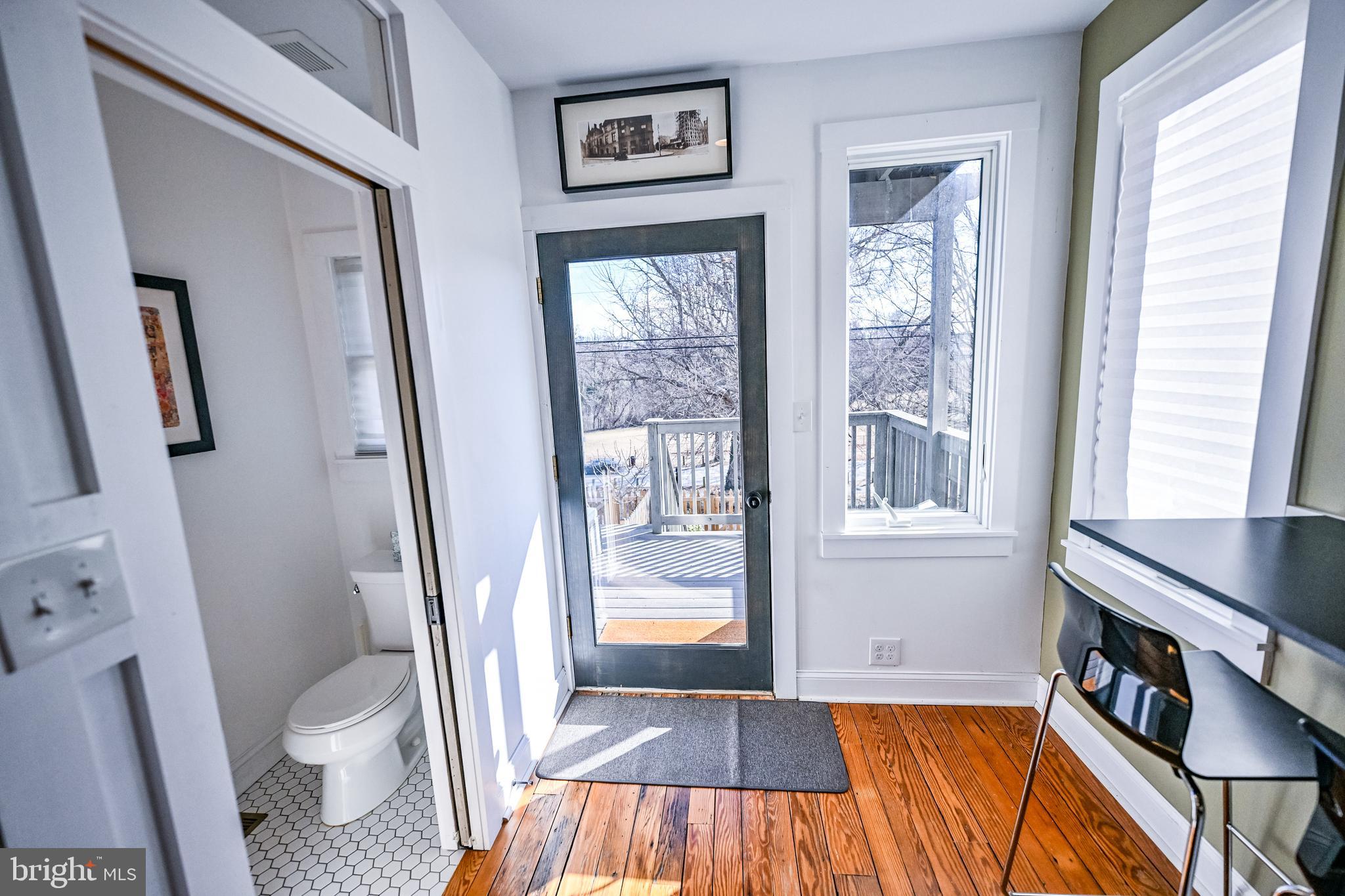 2939 Keswick Road Baltimore, MD 21211 - Photo 24 of 55 Door to rear deck and fenced yard