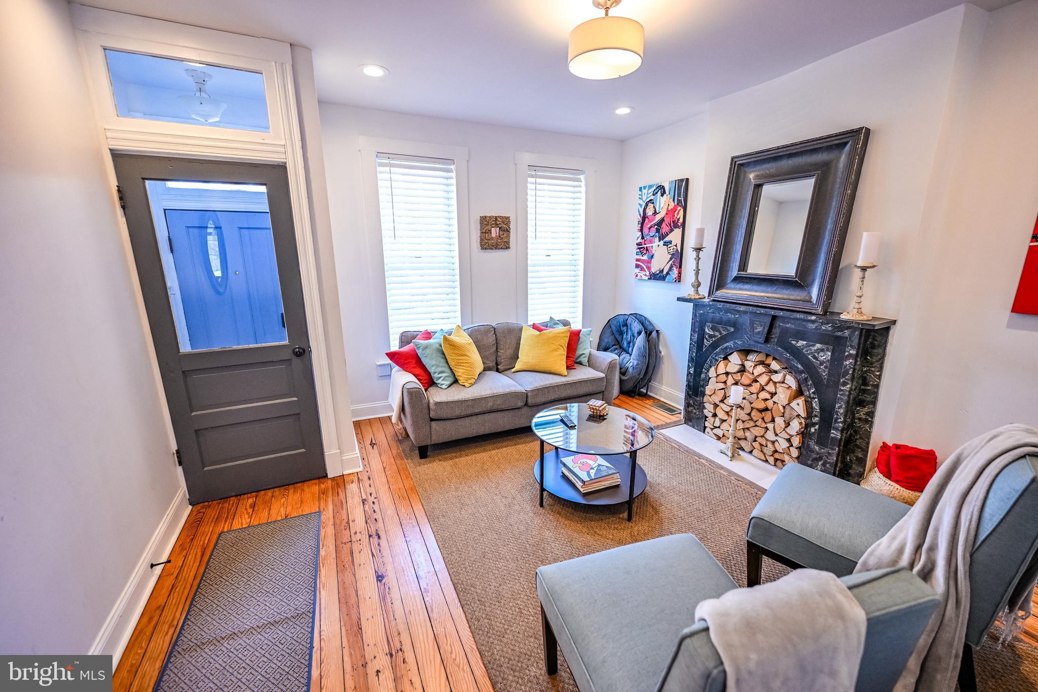 2939 Keswick Road Baltimore, MD 21211 - Photo 6 of 55 Living room w/ heart pine flooring