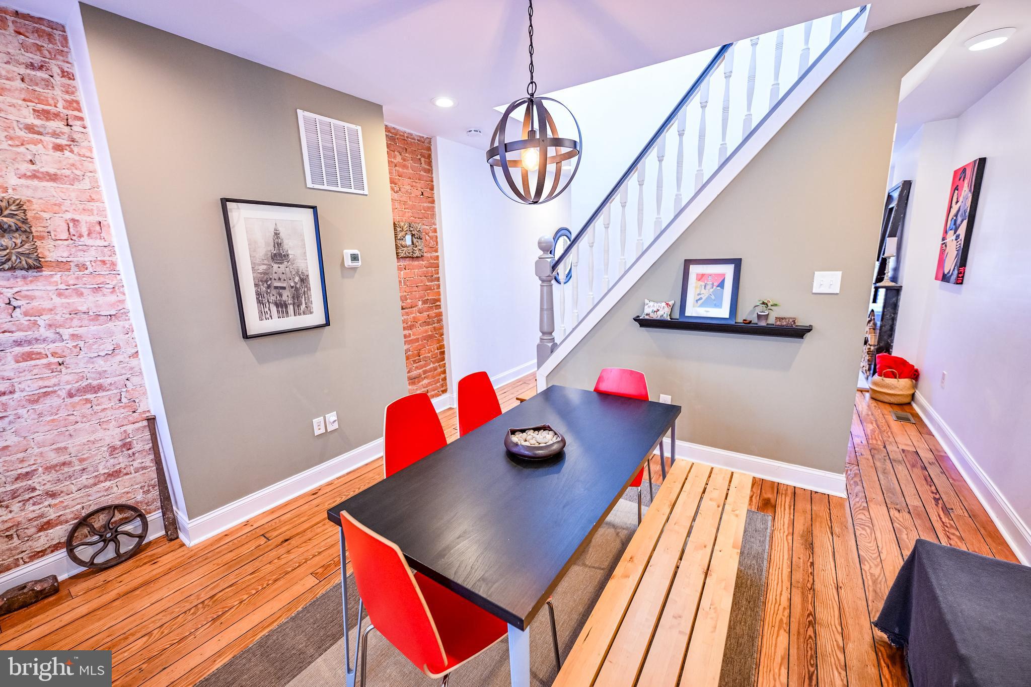 2939 Keswick Road Baltimore, MD 21211 - Photo 9 of 55 Dining room w/ heart pine flooring