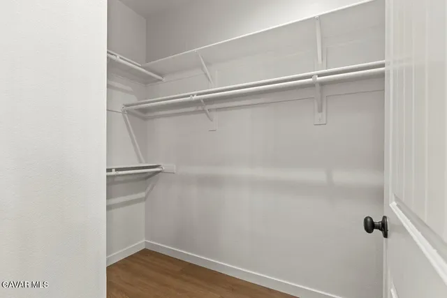 a view of an empty walk in closet