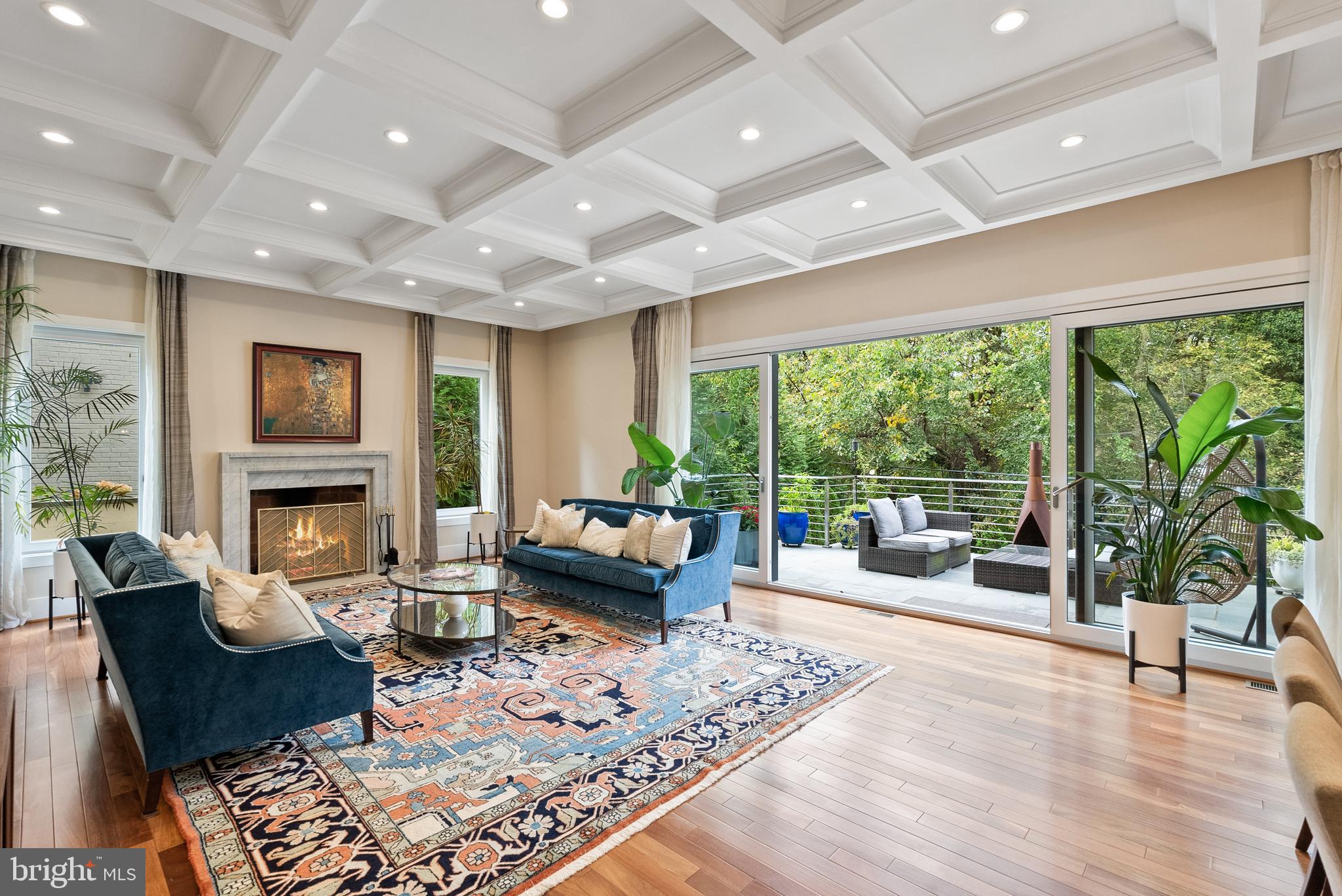 5152 Linnean Terrace Northwest Washington, DC 20008 - Photo 10 of 39 a living room with fireplace furniture and a large window