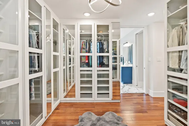 a view of a livingroom with furniture and staircase