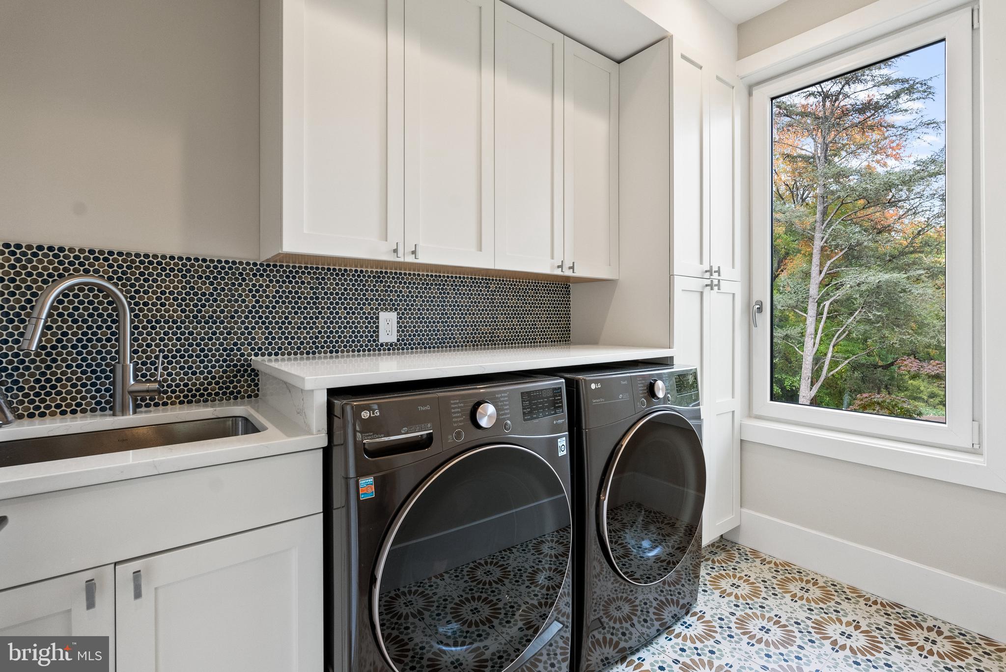 5152 Linnean Terrace Northwest Washington, DC 20008 - Photo 21 of 39 a utility room with dryer and washer