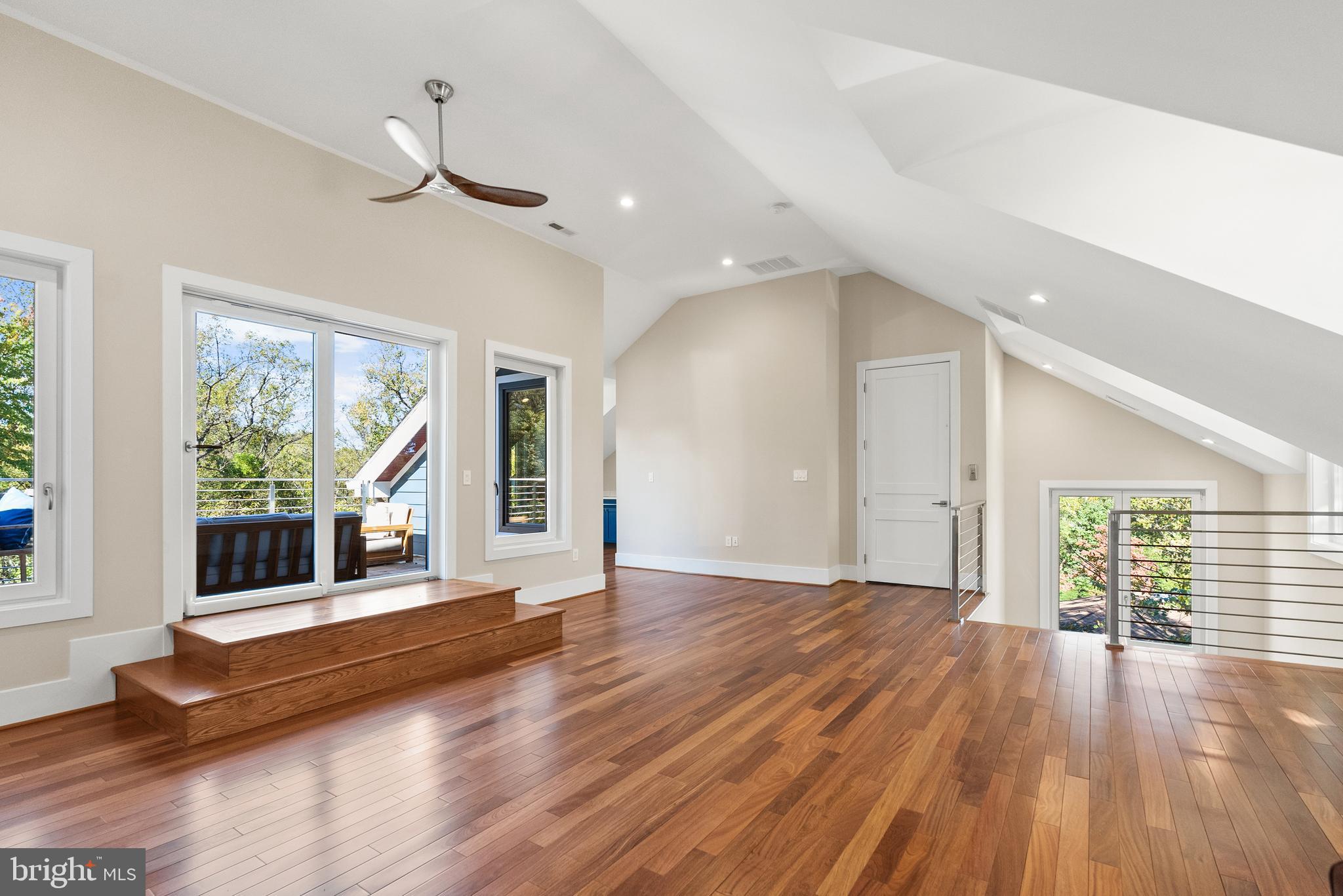 5152 Linnean Terrace Northwest Washington, DC 20008 - Photo 23 of 39 a view of a living room with wooden floor and large window