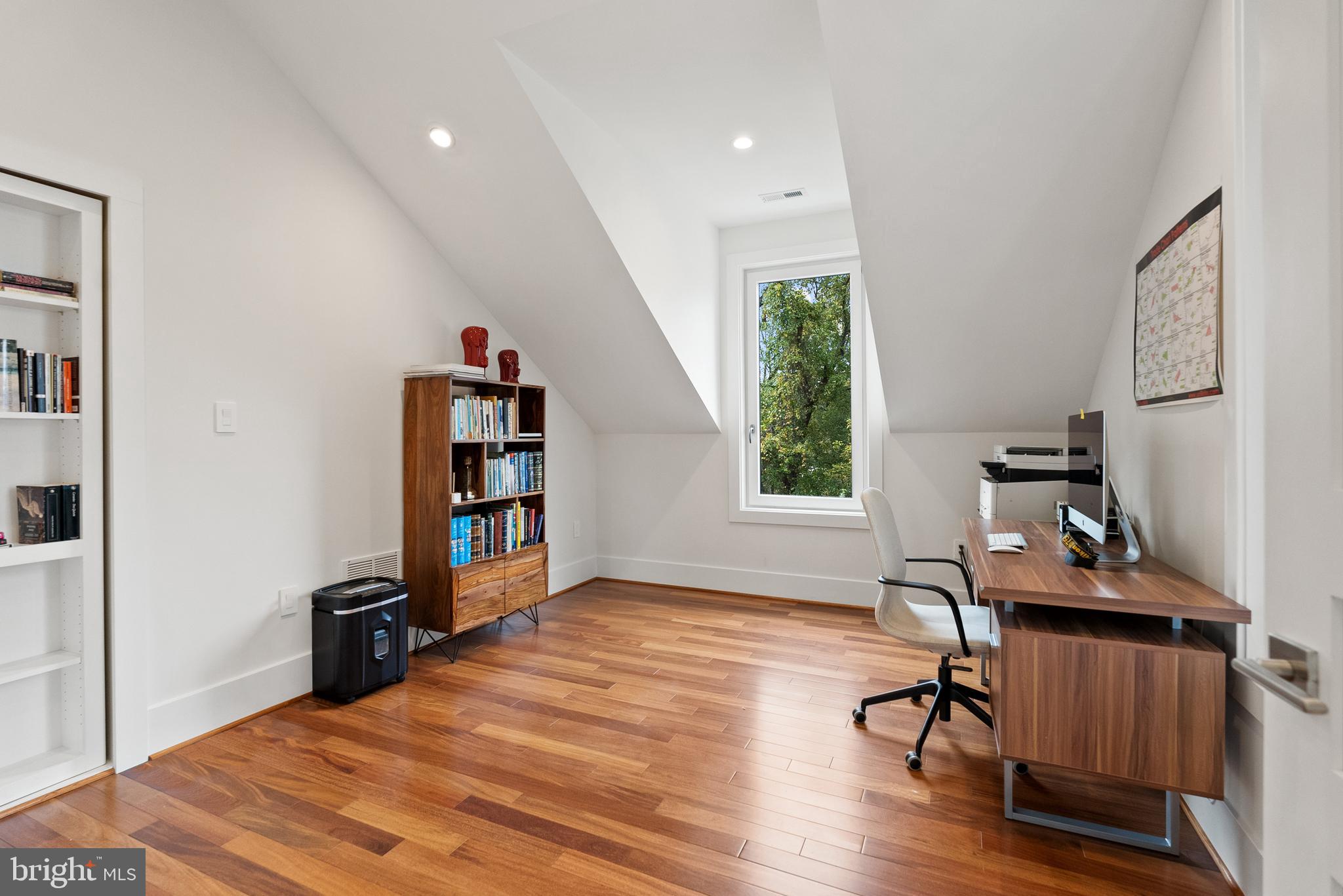 5152 Linnean Terrace Northwest Washington, DC 20008 - Photo 25 of 39 a view of a workspace with furniture and a window