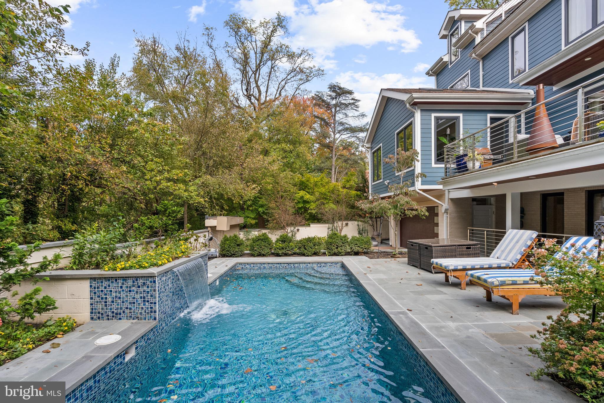 5152 Linnean Terrace Northwest Washington, DC 20008 - Photo 30 of 39 a view of a patio with chair and tables back yard of the house
