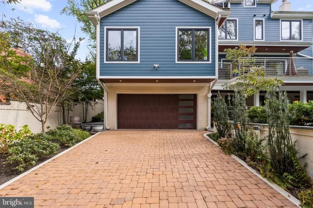 a front view of a house with yard