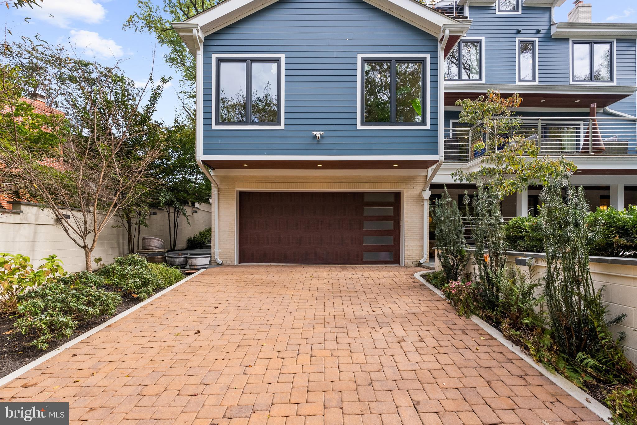 5152 Linnean Terrace Northwest Washington, DC 20008 - Photo 36 of 39 a front view of a house with yard