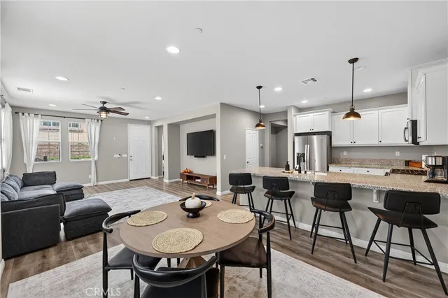 a view of a dining room with furniture