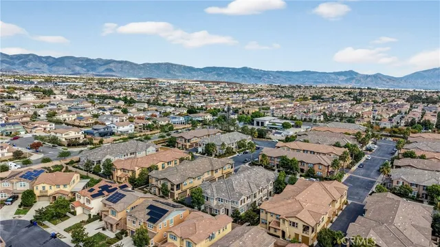 an aerial view of residential house with outdoor space