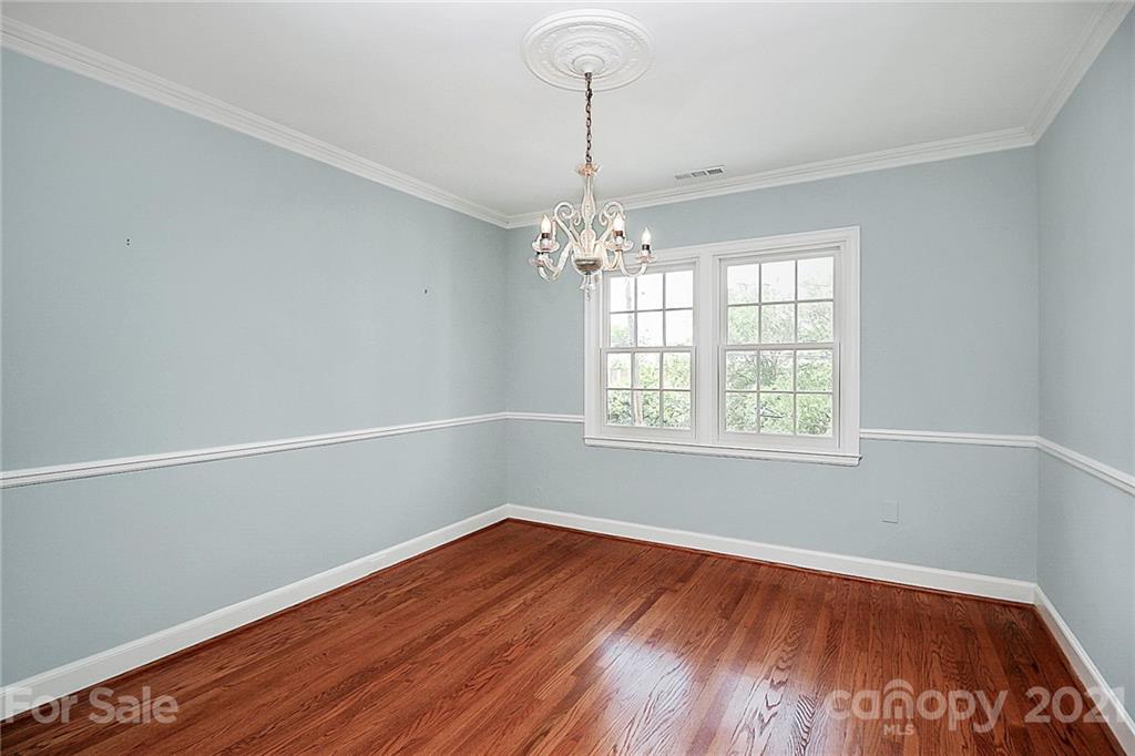 930 Ardsley Road, Unit B4 Charlotte, NC 28207 - Photo 16 of 35 wooden floor in an empty room with a window