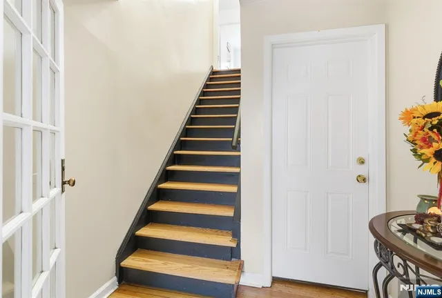 a view of entryway with wooden floor