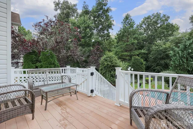 a view of roof deck with furniture