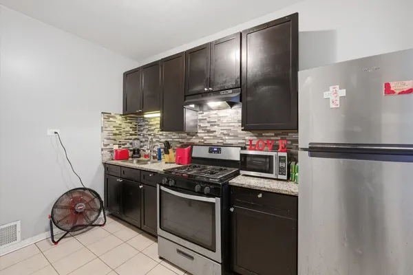 $535,000 | 7717 South Sangamon Street, Chicago, IL 60620