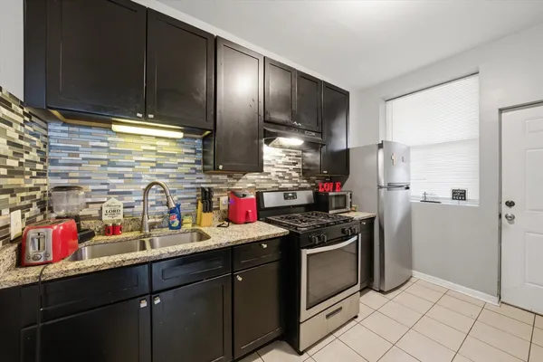 $535,000 | 7717 South Sangamon Street, Chicago, IL 60620