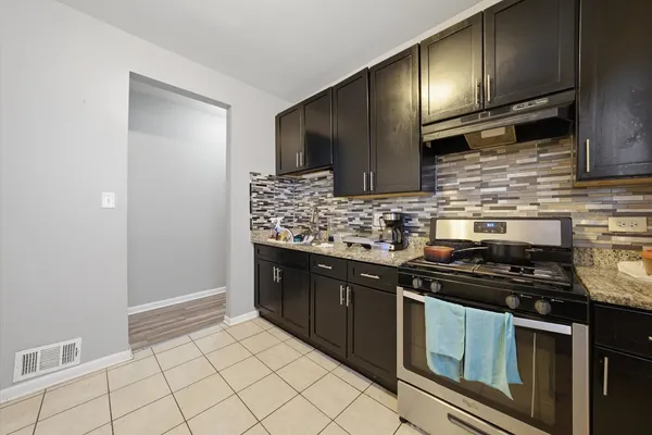 $535,000 | 7717 South Sangamon Street, Chicago, IL 60620