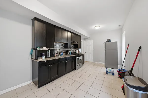 $535,000 | 7717 South Sangamon Street, Chicago, IL 60620