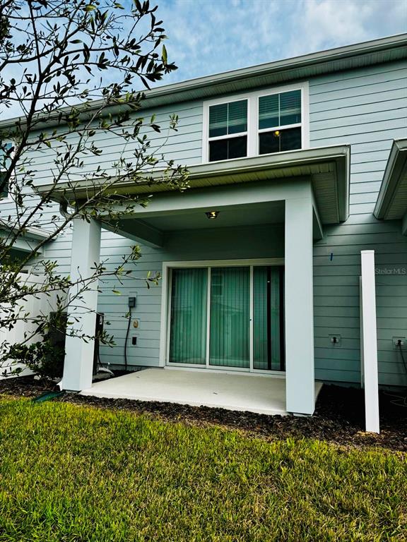 2710 Fetching Trail Davenport, FL 33896 - Photo 15 of 20 a front view of a house with a garden