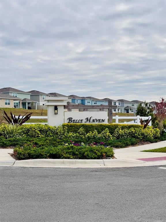 2710 Fetching Trail Davenport, FL 33896 - Photo 20 of 20 front view of a house with a garden