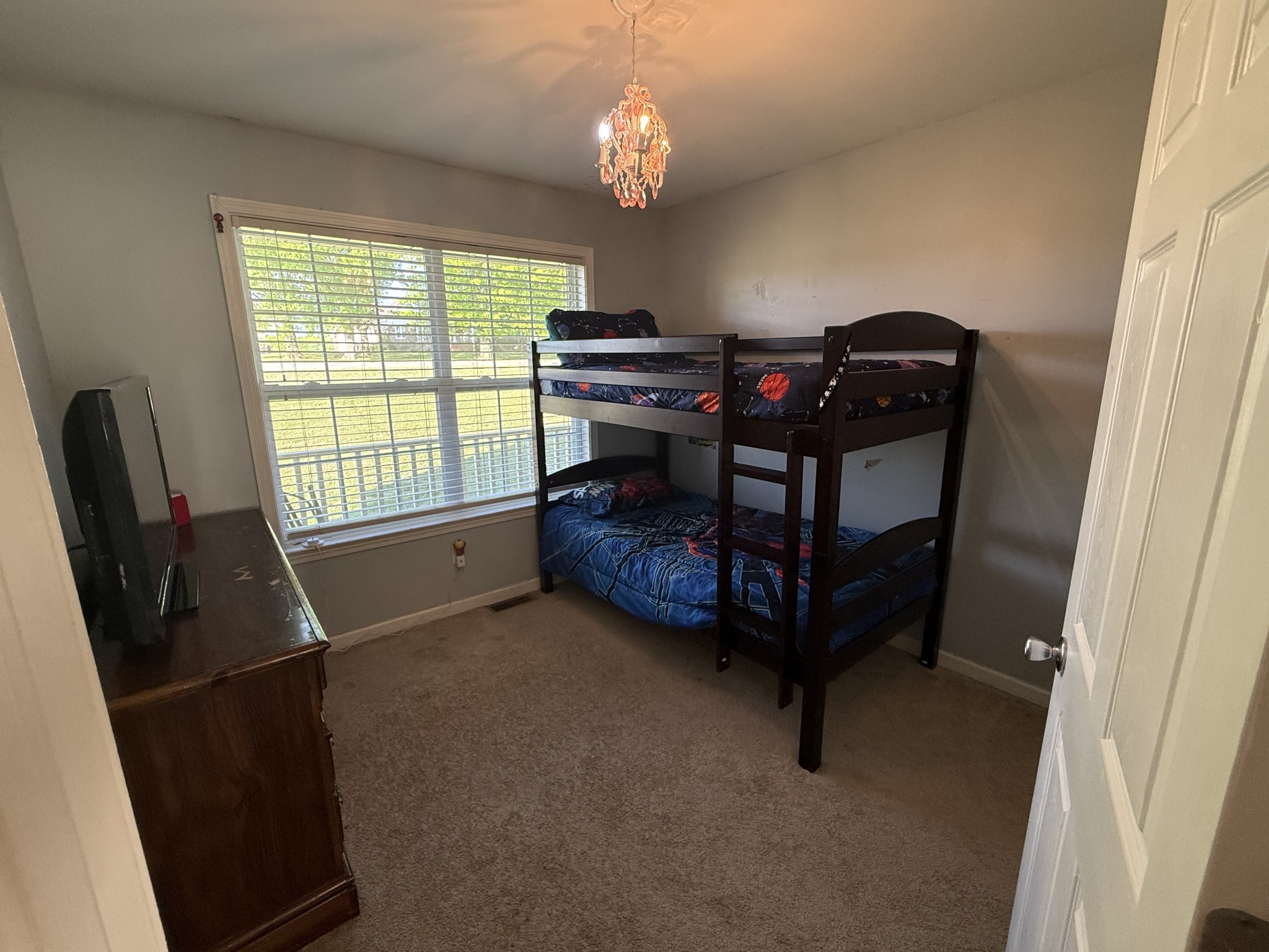 1702 Abiff Road Burns, TN 37029 - Photo 28 of 47 a bedroom with furniture and windows