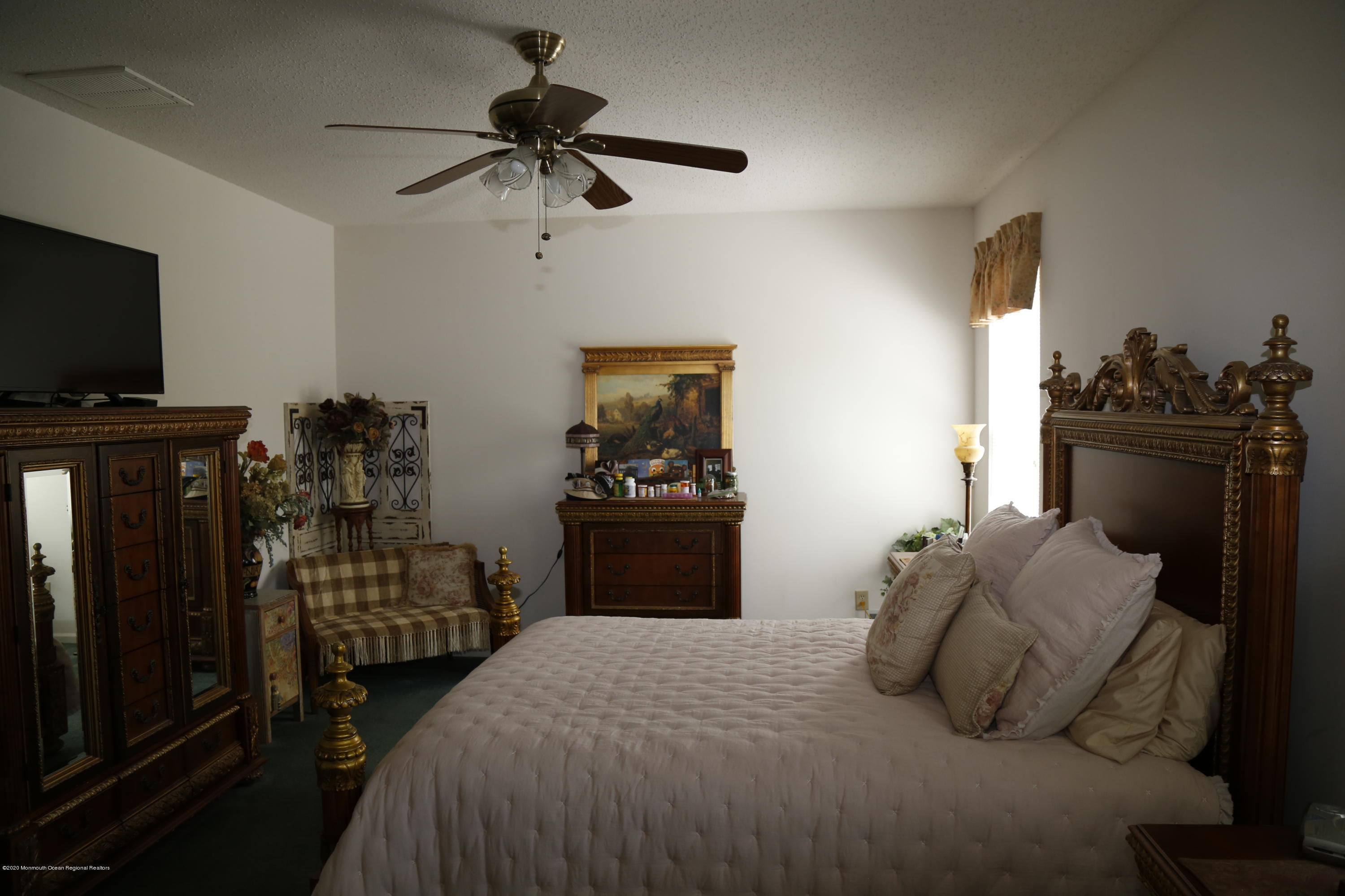 149 Sandpiper Road Barnegat, NJ 08005 - Photo 14 of 18 a bedroom with a bed and a flat tv screen