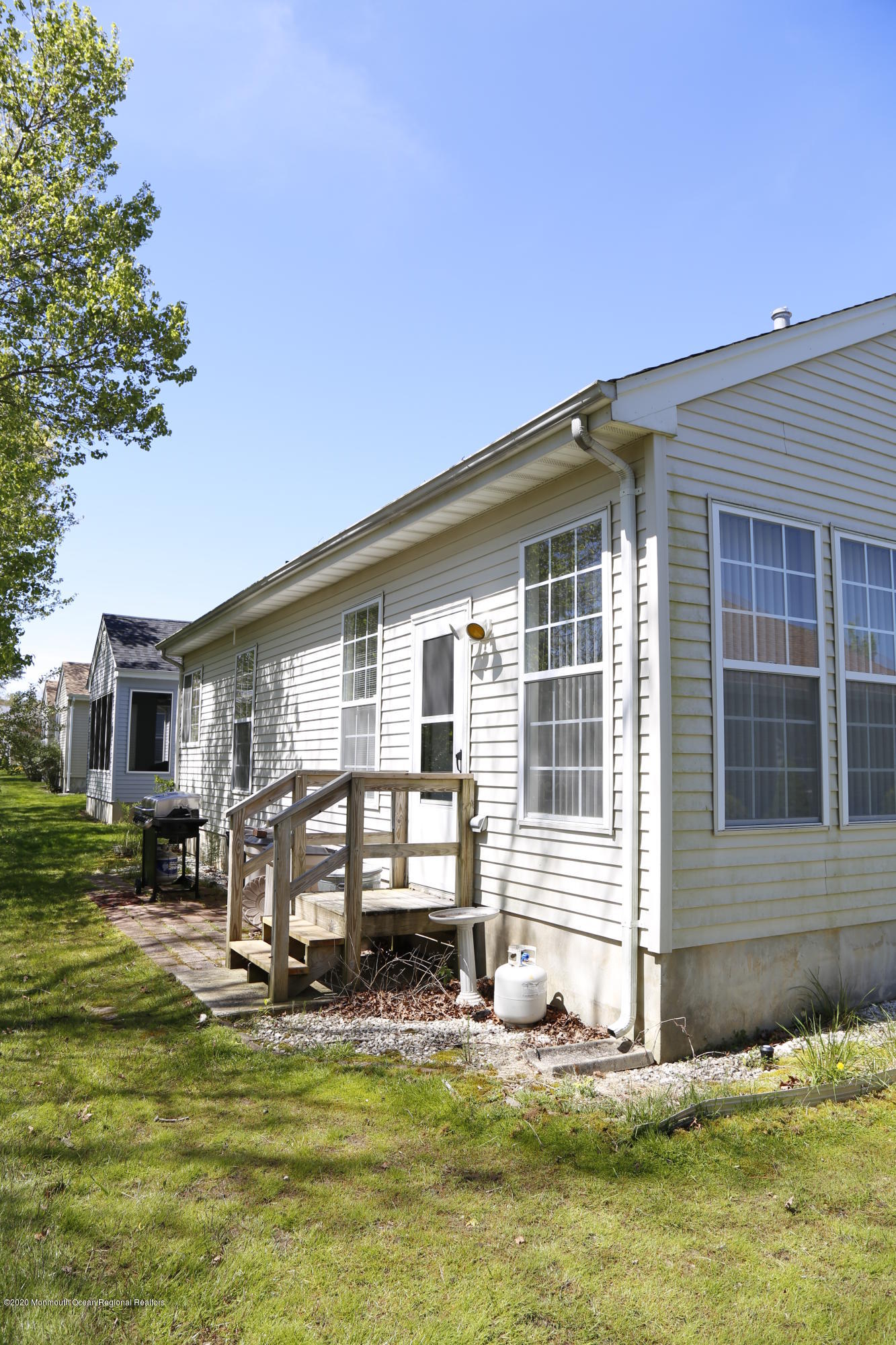 149 Sandpiper Road Barnegat, NJ 08005 - Photo 17 of 18 a view of a house with swimming pool in front of it