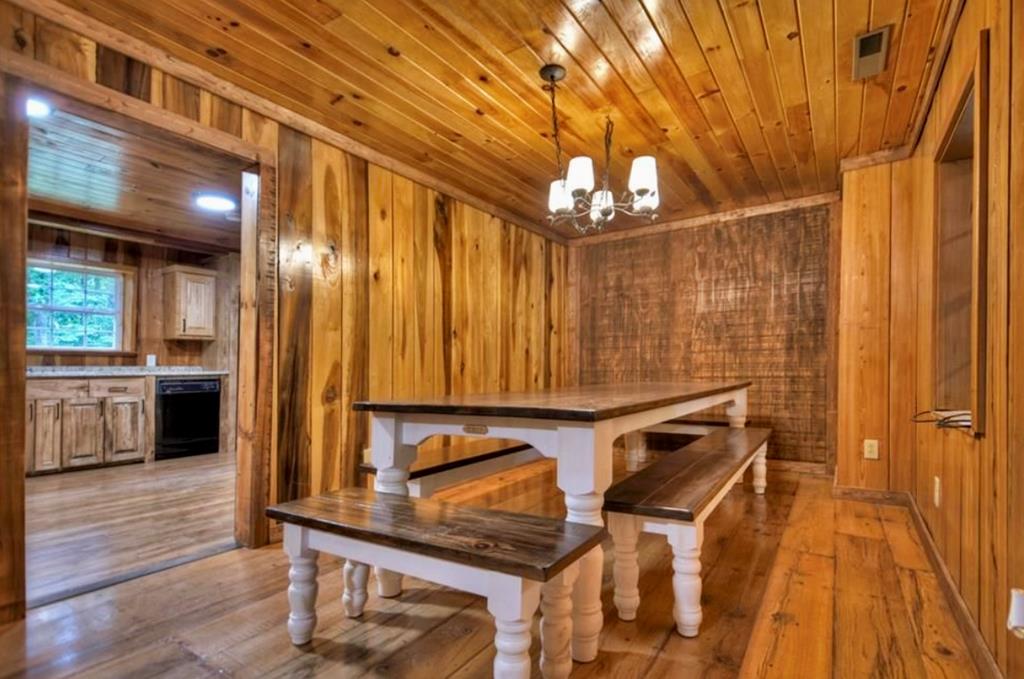 1843 Old Mobile Road McCaysville, GA 30555 - Photo 12 of 41 a view of a hallway with wooden floor and a sink