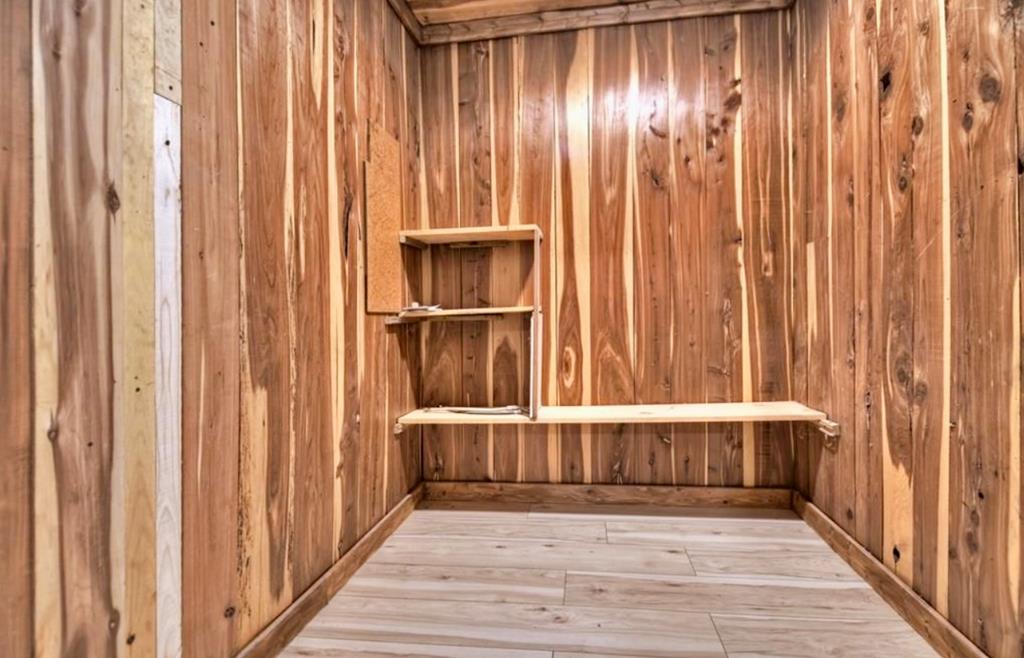 1843 Old Mobile Road McCaysville, GA 30555 - Photo 16 of 41 a view of a room with wooden floor and chair