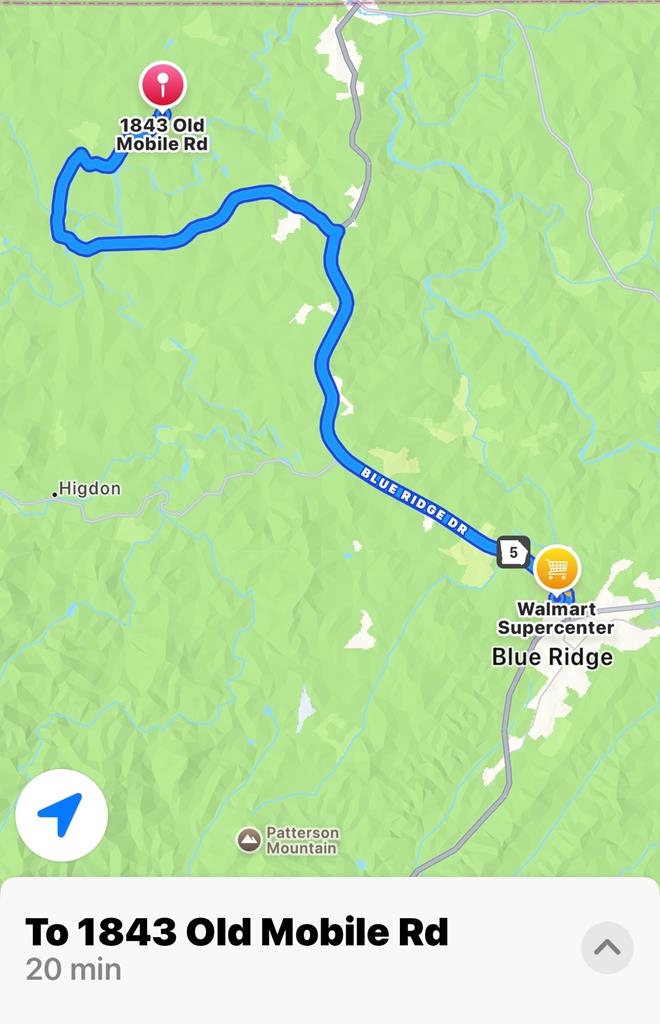 1843 Old Mobile Road McCaysville, GA 30555 - Photo 20 of 41 a picture of a book in a field