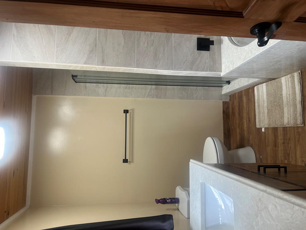 1843 Old Mobile Road McCaysville, GA 30555 - Photo 23 of 41 a bathroom with a sink and a mirror