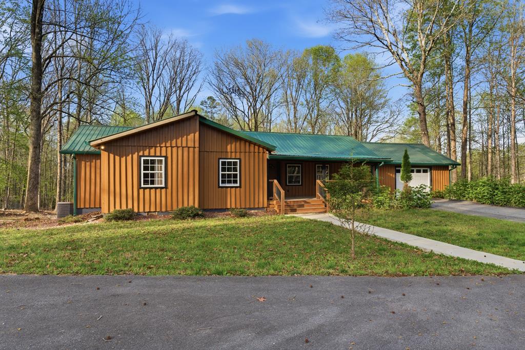 1843 Old Mobile Road McCaysville, GA 30555 - Photo 25 of 41 a view of a house with a yard