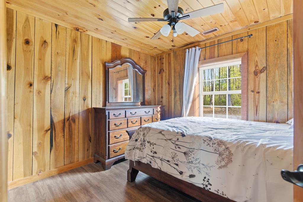 1843 Old Mobile Road McCaysville, GA 30555 - Photo 36 of 41 a bedroom with a bed a window and shower