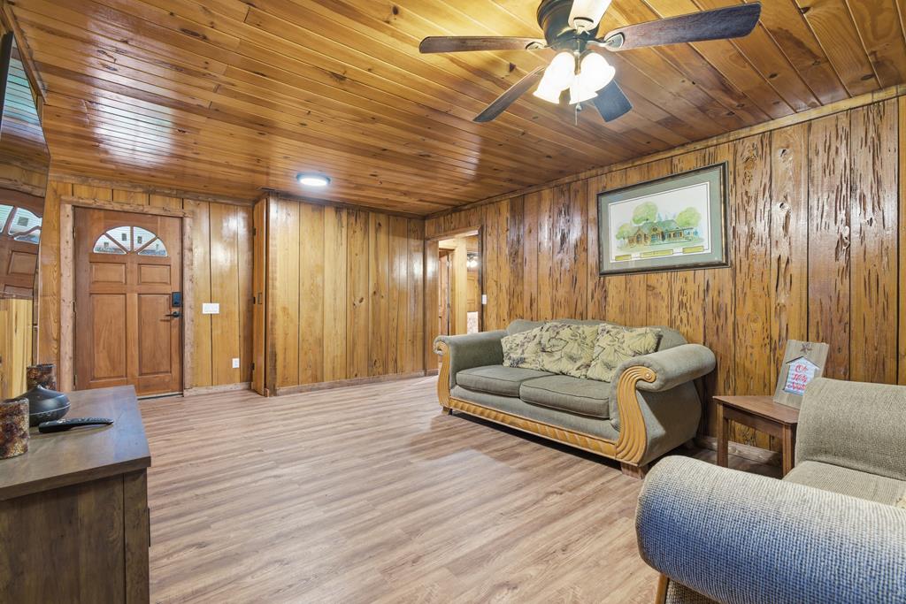 1843 Old Mobile Road McCaysville, GA 30555 - Photo 38 of 41 a living room with furniture and a wooden floor