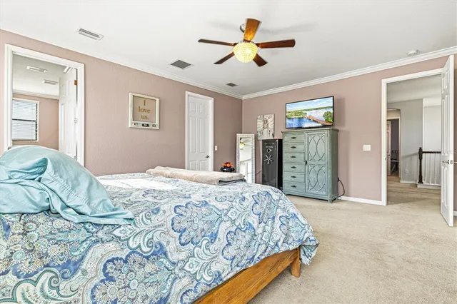 a bedroom with furniture and a bed