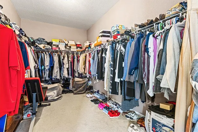 a view of a chairs and table in the patio