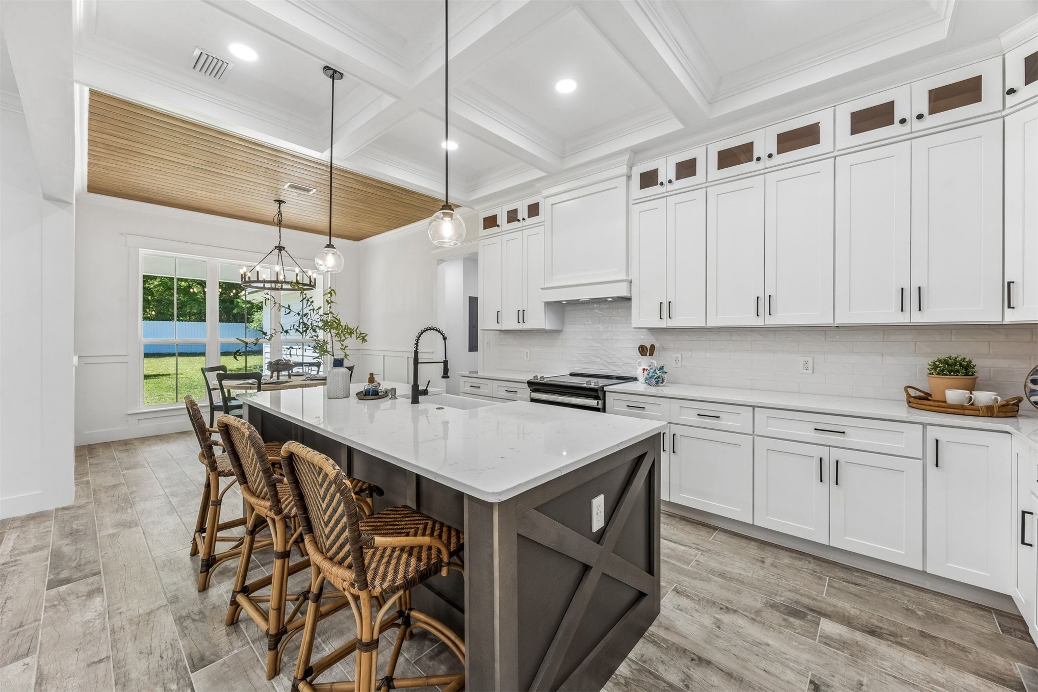 95121 North Ellis Landing Road Fernandina Beach, FL 32034 - Photo 6 of 37 a kitchen with stainless steel appliances granite countertop a sink a stove and a refrigerator