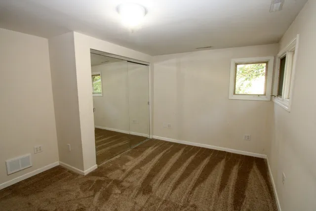 an empty room with closet