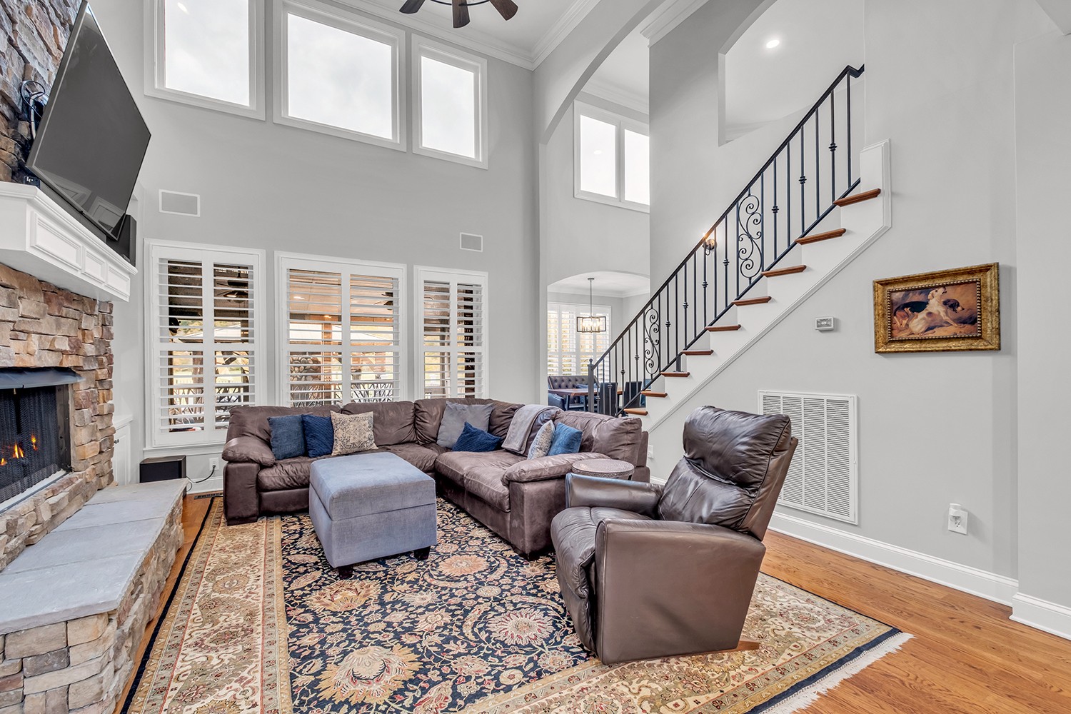 5210 Old Harding Road Franklin, TN 37064 - Photo 11 of 65 a living room with furniture wooden floor and a fireplace