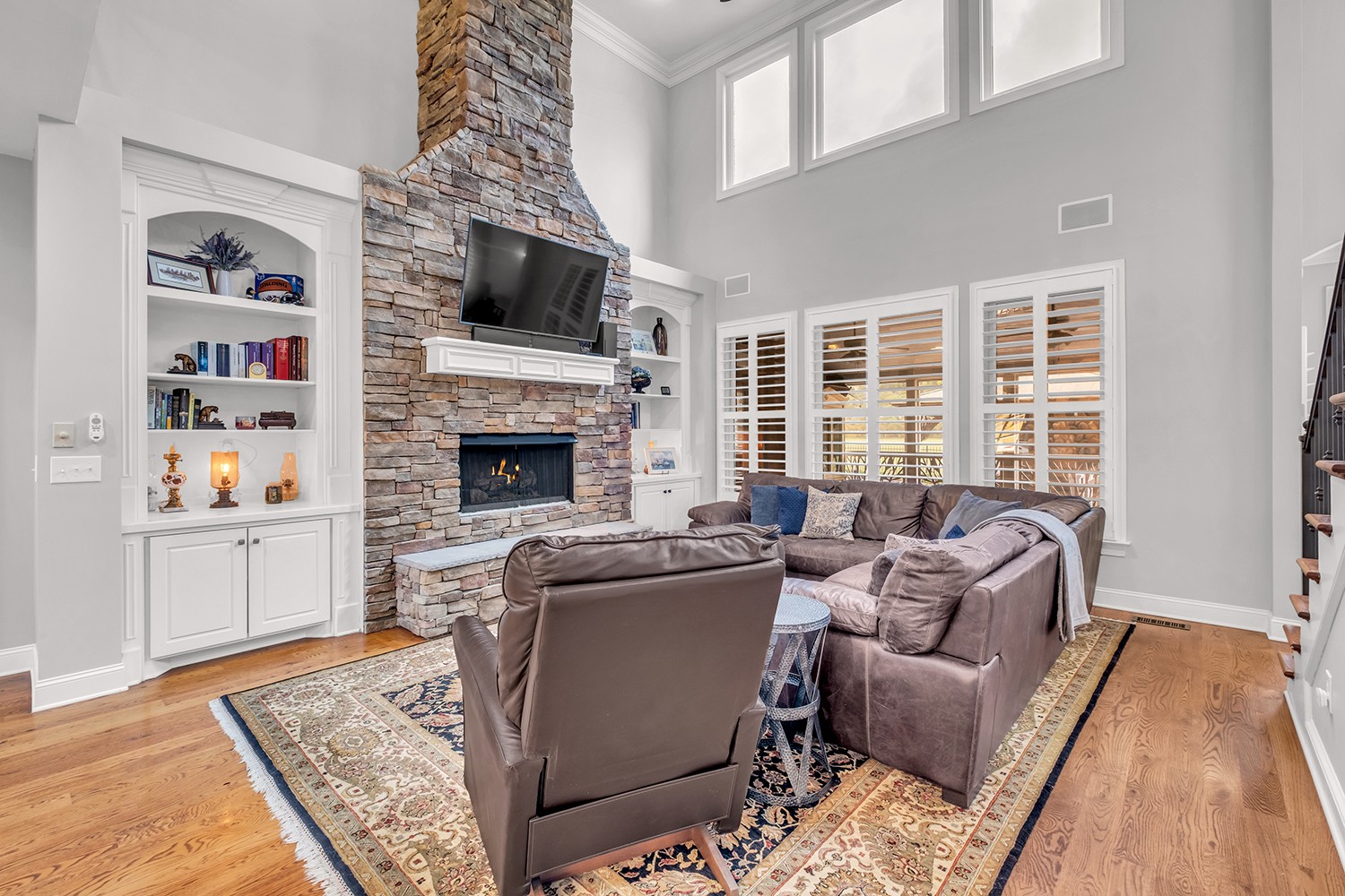 5210 Old Harding Road Franklin, TN 37064 - Photo 12 of 65 a living room with furniture and a fireplace