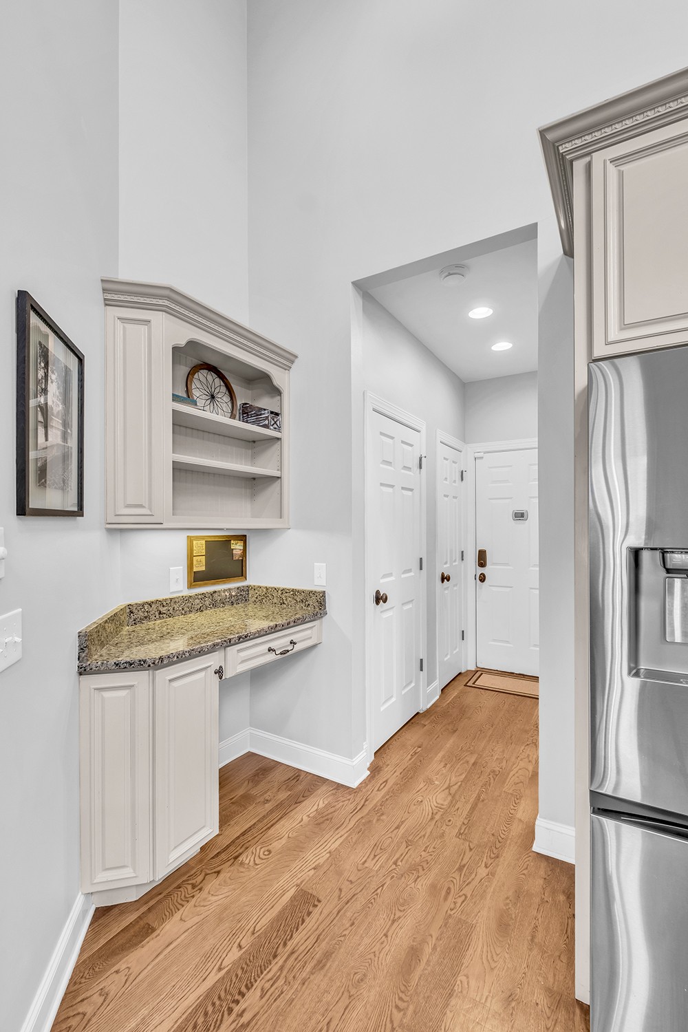 5210 Old Harding Road Franklin, TN 37064 - Photo 20 of 65 a kitchen with stainless steel appliances a stove and a refrigerator