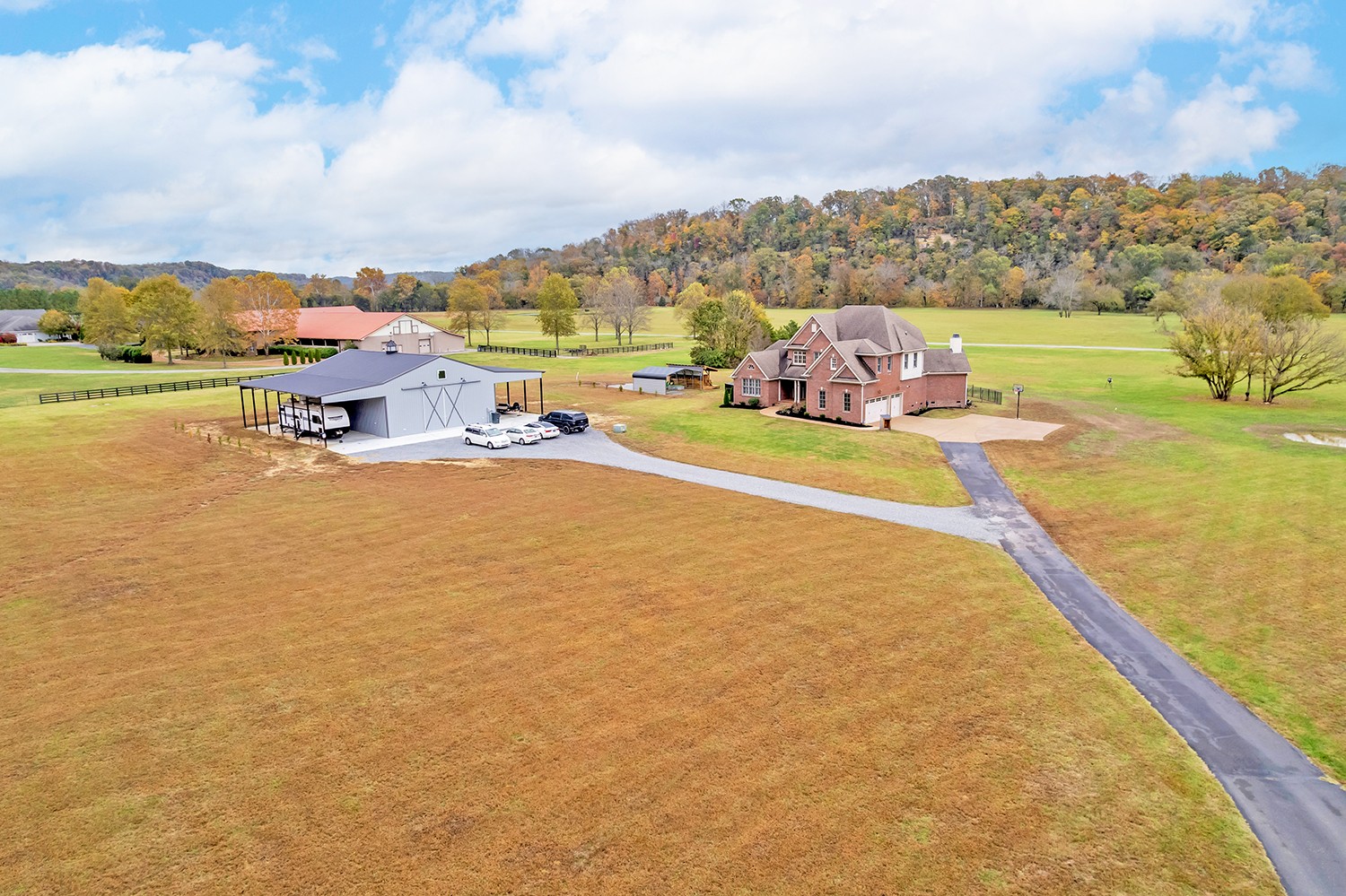 5210 Old Harding Road Franklin, TN 37064 - Photo 2 of 65 a view of a lake with houses in the back