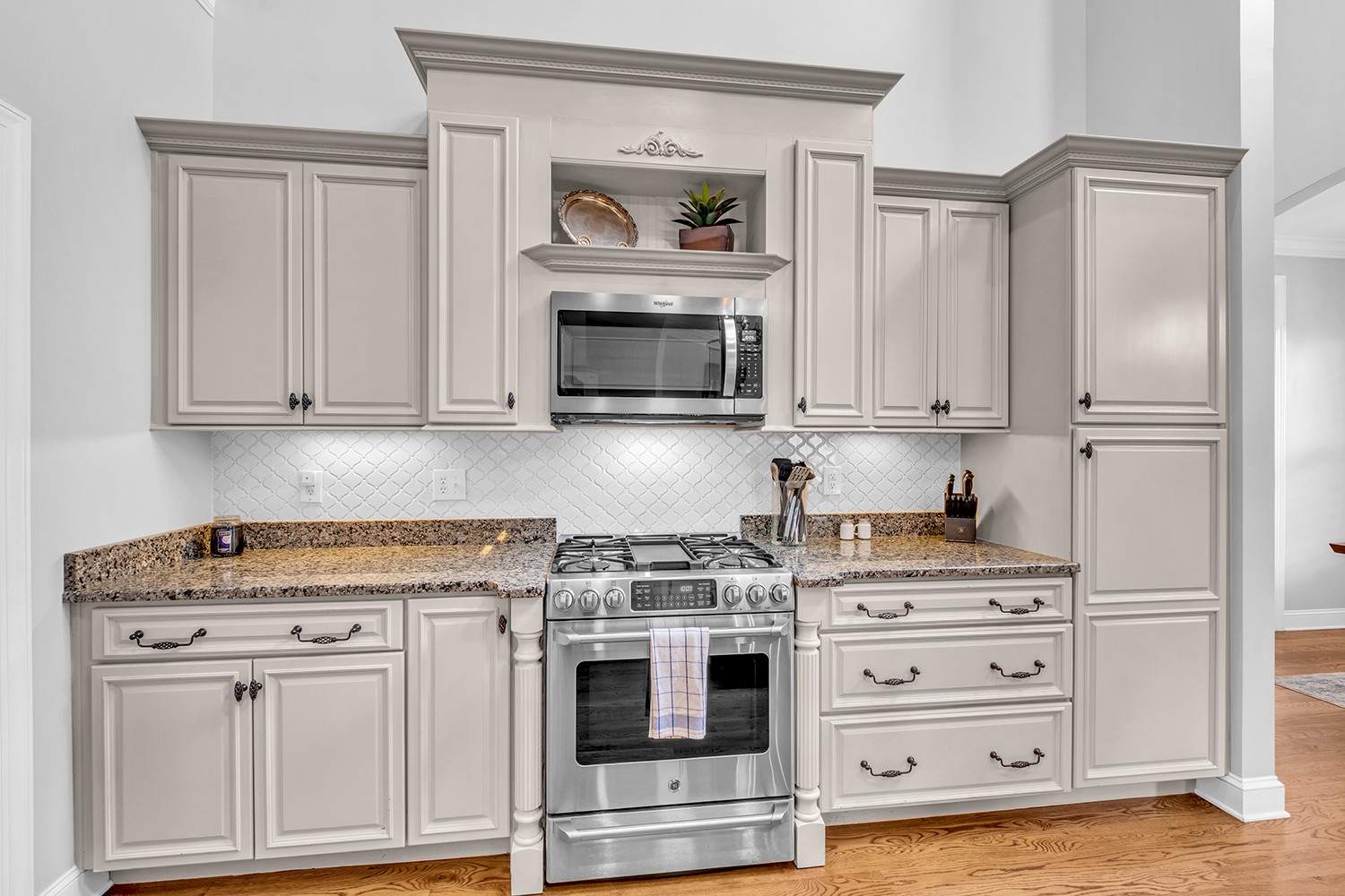 5210 Old Harding Road Franklin, TN 37064 - Photo 22 of 65 a kitchen with cabinets appliances and a counter space