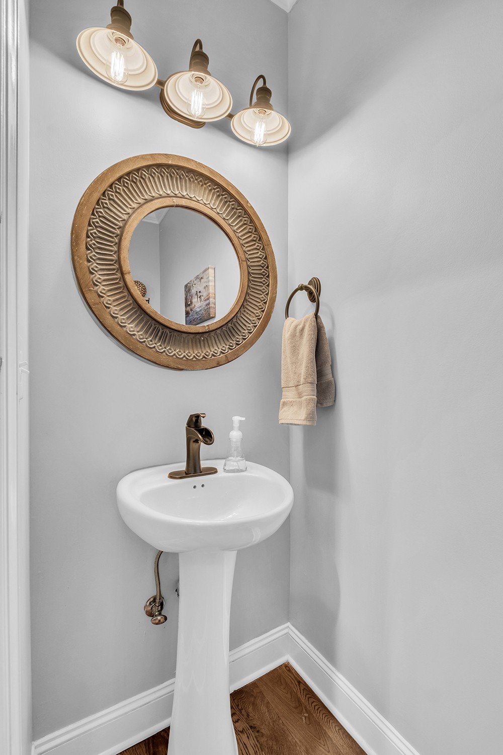5210 Old Harding Road Franklin, TN 37064 - Photo 31 of 65 a bathroom with a sink and a mirror
