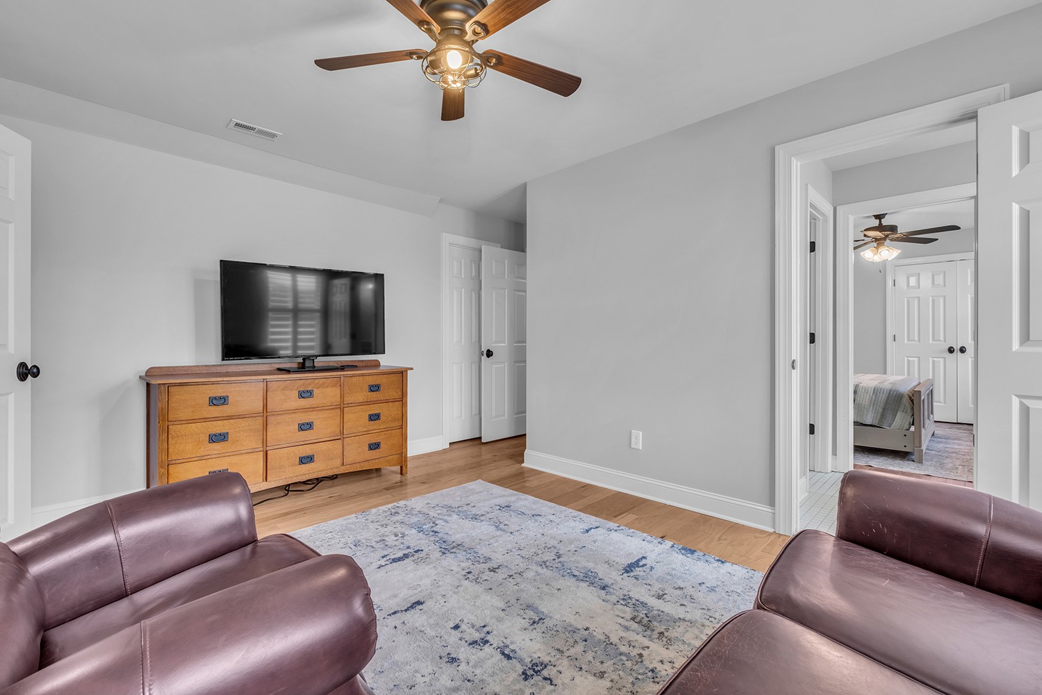 5210 Old Harding Road Franklin, TN 37064 - Photo 41 of 65 a living room with furniture and a flat screen tv