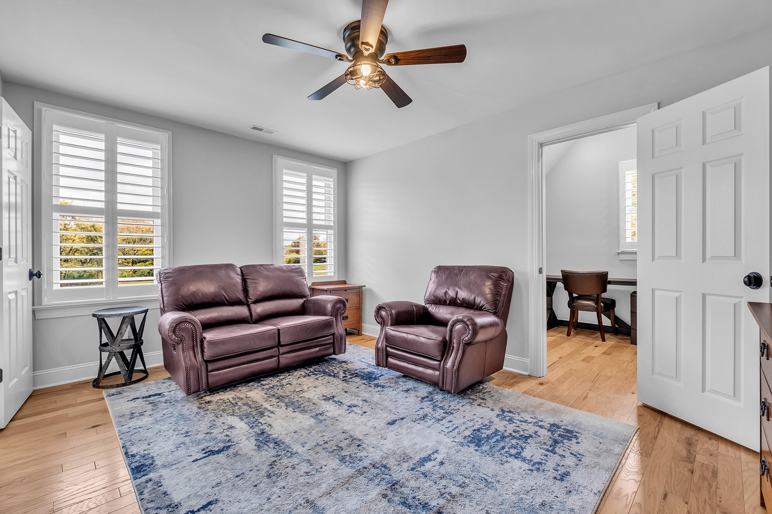 5210 Old Harding Road Franklin, TN 37064 - Photo 42 of 65 a living room with furniture ceiling fan and a window