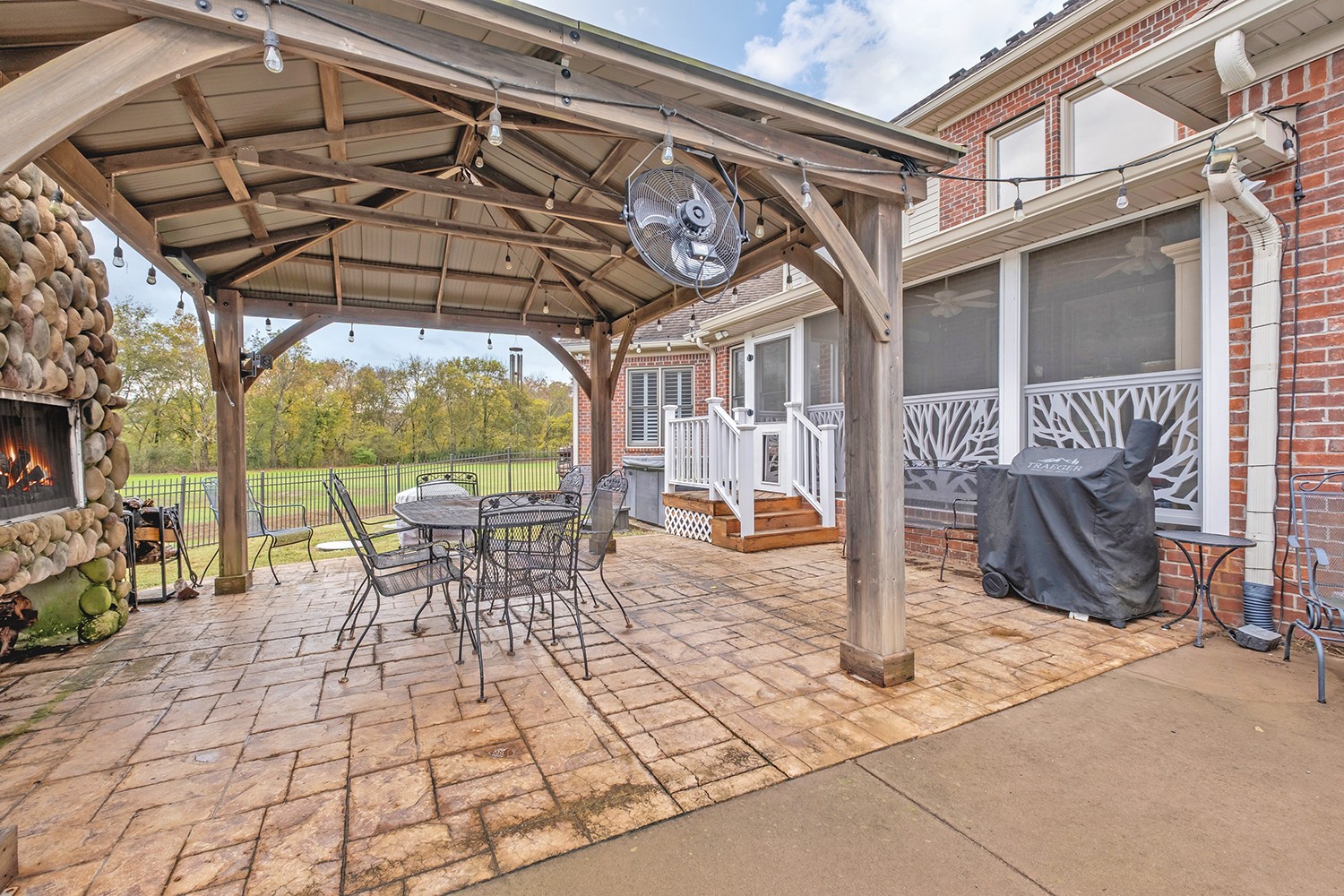 5210 Old Harding Road Franklin, TN 37064 - Photo 45 of 65 a view of a chairs and table in the patio